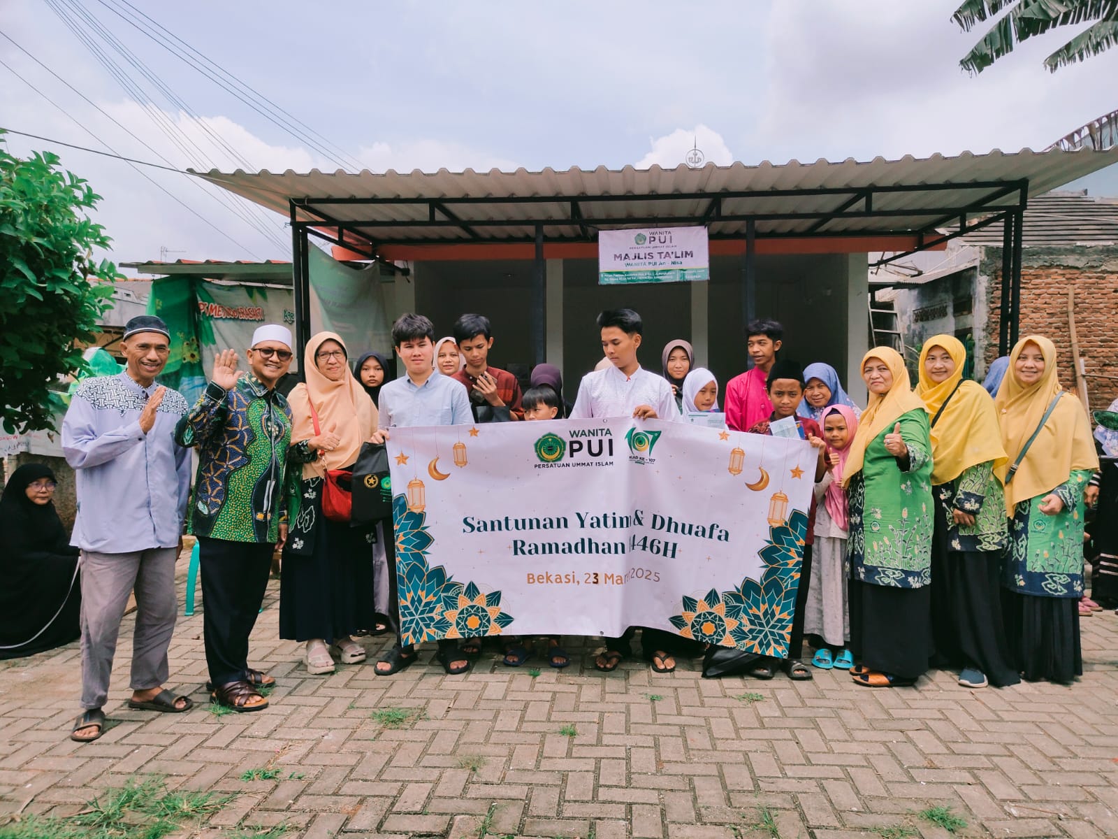PUI 23 Maret Alimudin dalam agenda santunan PUI di Bantargebang